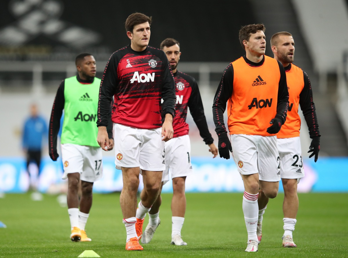 Newcastle United v Manchester United - St James' Park, Newcastle, Britain - October 17, 2020 Manchester United's Harry Maguire, Victor Lindelof, Luke Shaw, Bruno Fernandes and Fred during the warm up before the match Pool via REUTERS/Alex Pantling 