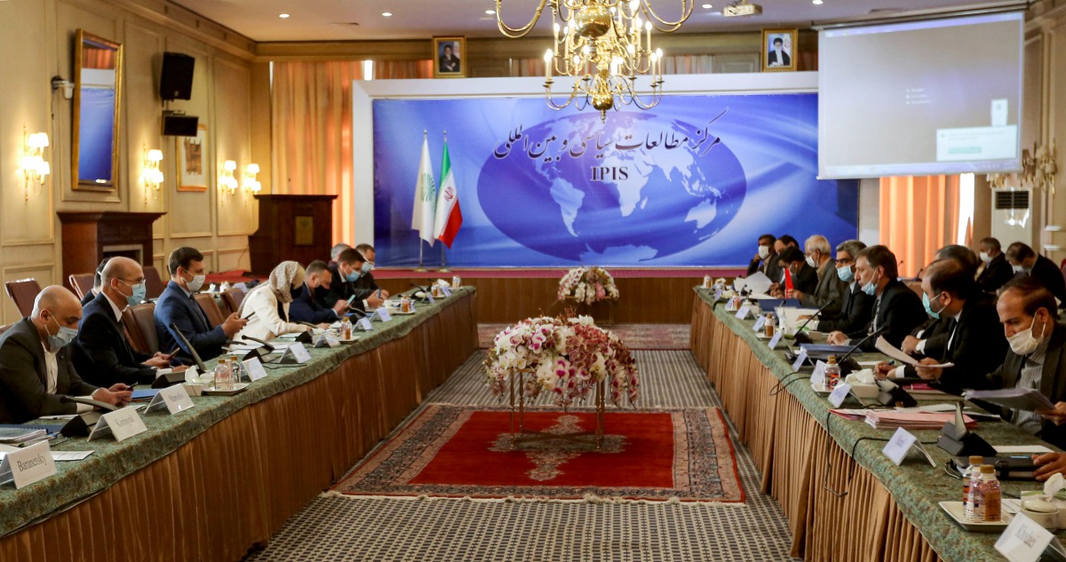 This picture taken on October 19, 2020 shows (L to R) delegations from Ukraine and Iran meeting in Tehran for the second round of talks on compensation for the families of victims of the Ukraine International Airlines Flight 752 crash. / AFP / ATTA KENARE