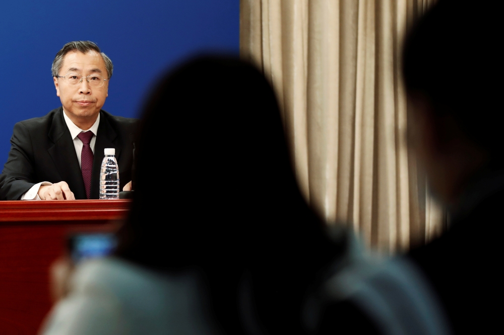 Liu Jingzhen, chairman of China National Pharmaceutical Group (Sinopharm), attends a news conference on vaccines for the coronavirus disease (COVID-19), in Beijing, China October 20, 2020. REUTERS/Carlos Garcia Rawlins
