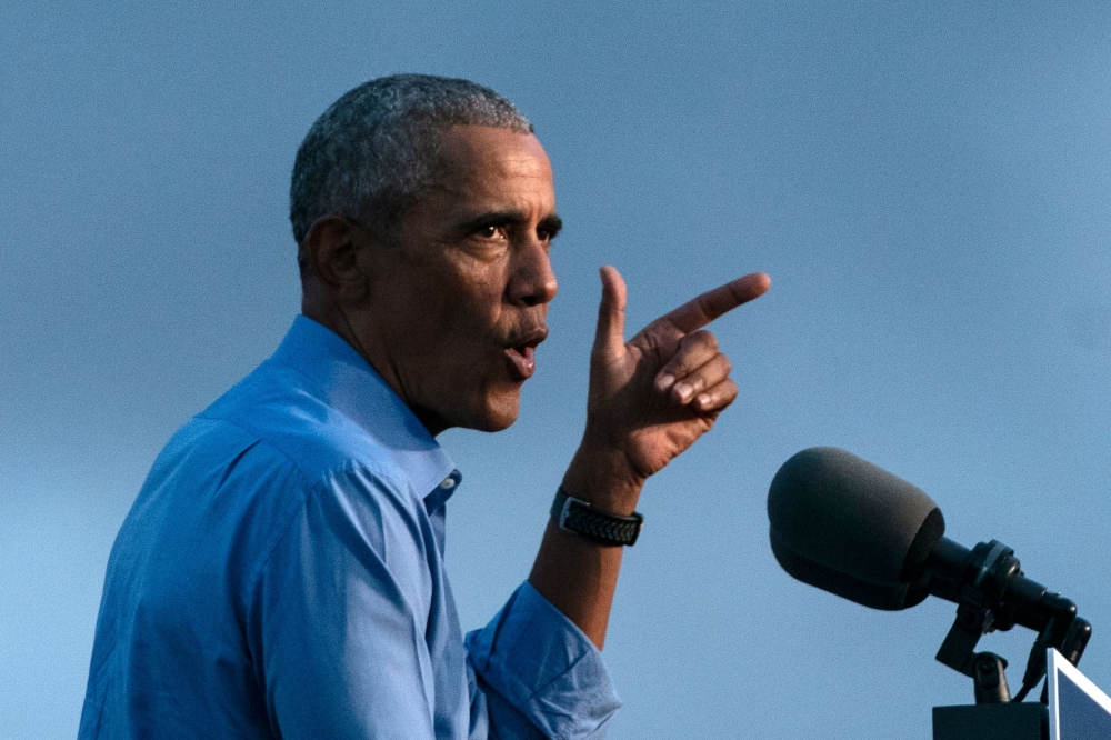 Former US President Barack Obama addresses Biden-Harris supporters during a drive-in rally in Philadelphia, Pennsylvania on October 21, 2020.  AFP / Alex Edelman