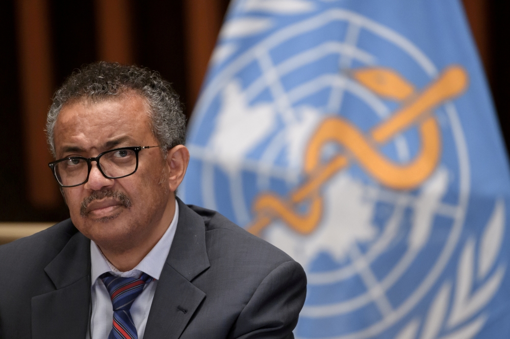 FILE PHOTO: World Health Organization (WHO) Director-General Tedros Adhanom Ghebreyesus attends a news conference organized by Geneva Association of United Nations Correspondents (ACANU) amid the COVID-19 outbreak, caused by the novel coronavirus, at the 