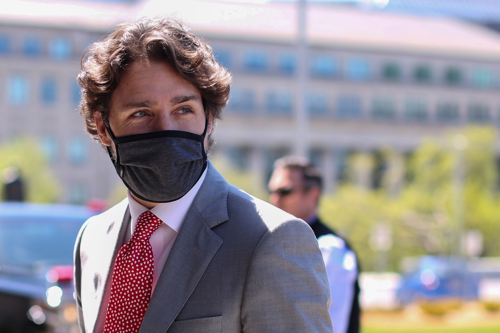 In this file photo taken on May 20, 2020, Canadian Prime Minister Justin Trudeau arrives on Parliament Hill to attend a sitting of the Special Committee on the Covid-19 Pandemic in Ottawa, Canada. Trudeau announced a deal on October 23, 2020, to procure 7