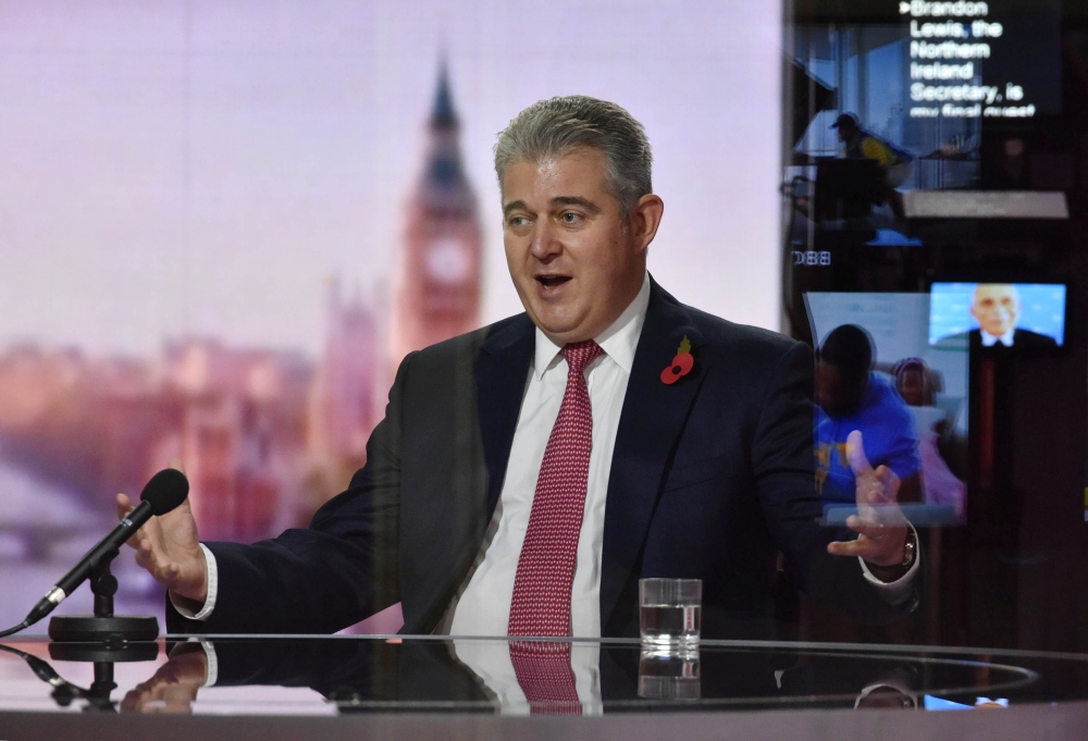 Britain's Secretary of State for Northern Ireland Brandon Lewis appears on BBC TV's The Andrew Marr Show in London, Britain October 25, 2020. Picture taken through glass. Jeff Overs/BBC/Handout via REUTERS