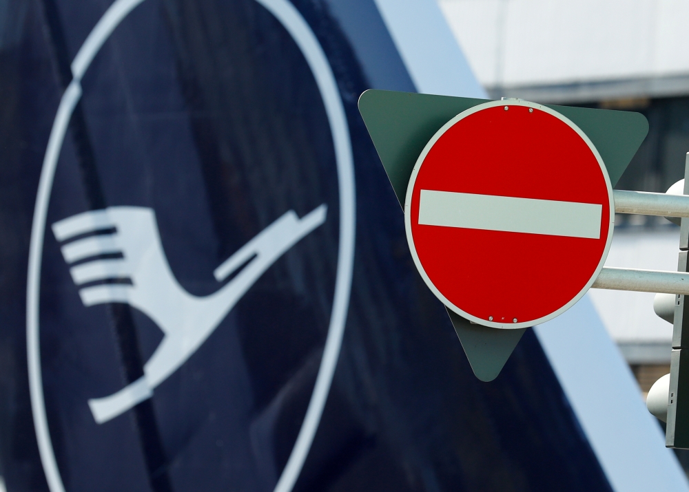 FILE PHOTO: The Lufthansa logo is pictured at Frankfurt Airport in Frankfurt, Germany, September 21, 2020. REUTERS/Ralph Orlowski