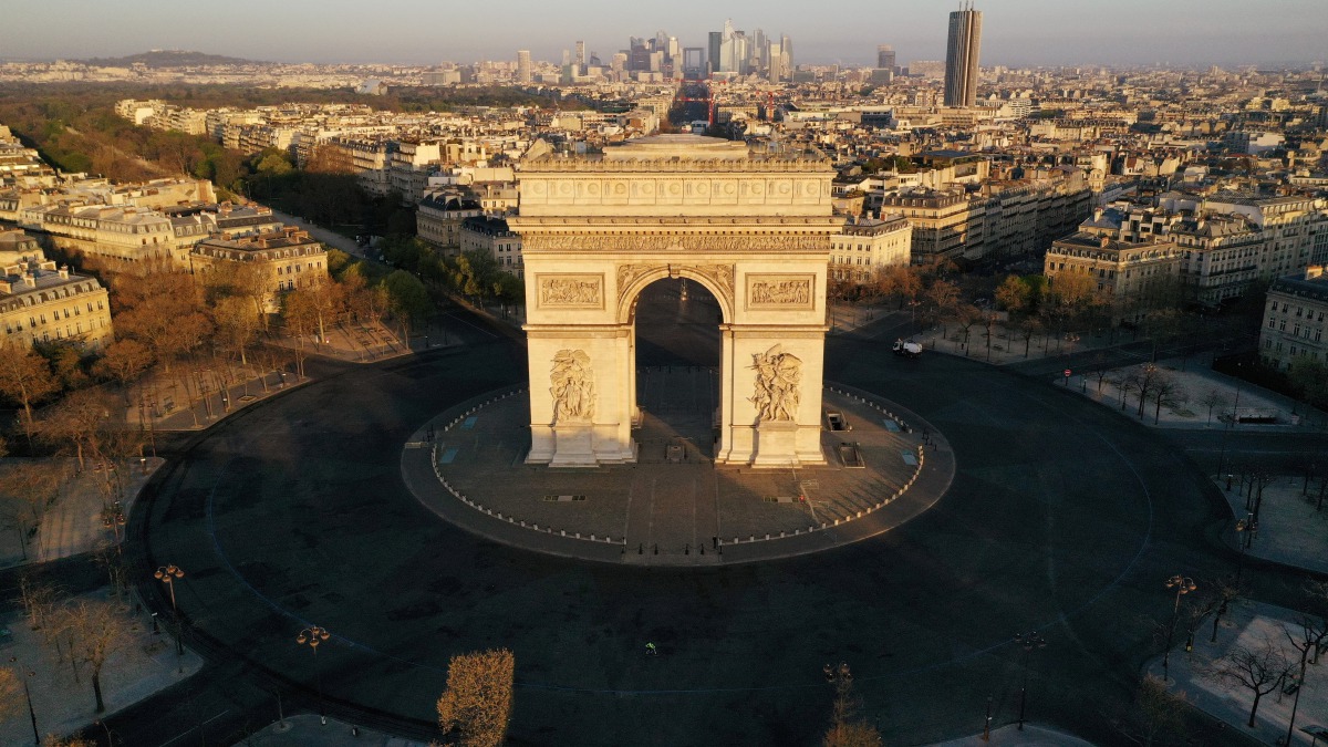 FILE PHOTO: An aerial view shows the deserted Place de l'Etoile and the Arc de Triomphe, during a lockdown imposed to slow the spread of the coronavirus disease (COVID-19) in Paris, France April 4, 2020. Picture taken with a drone. REUTERS/Pascal Rossigno