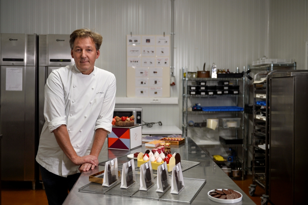 Belgian chocolatier Pierre Marcolini poses in his kitchen workshop after being crowned best pastry chef in the world by his peers at international competition, in Brussels, Belgium October 27, 2020. Picture taken October 27, 2020. REUTERS/Johanna Geron