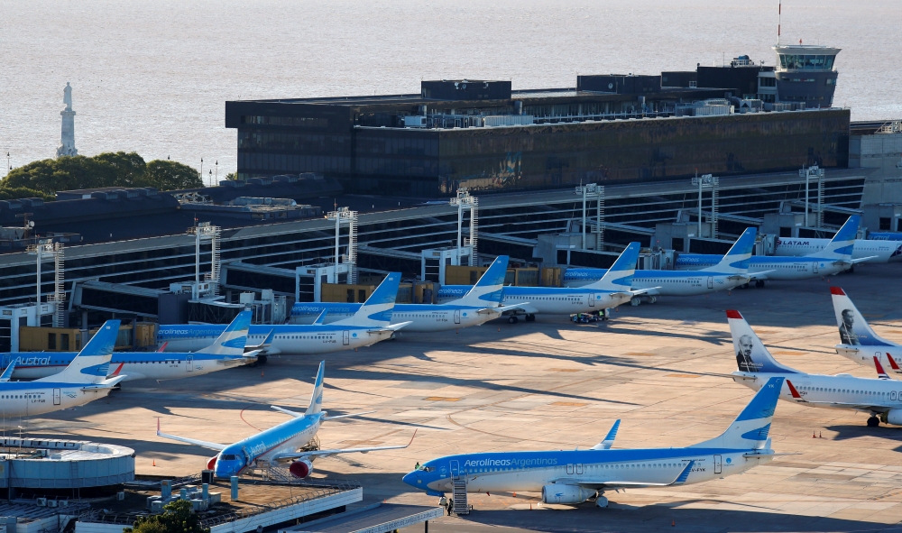 Airplanes are seen parked at Jorge Newbery domestic airport, as the spread of the coronavirus disease (COVID-19) continues, in Buenos Aires, Argentina April 29, 2020. REUTERS/Agustin Marcarian/File Photo