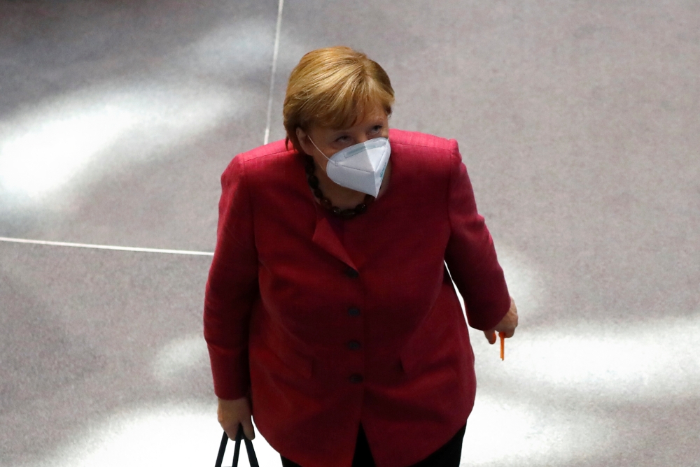 German Chancellor Angela Merkel leaves after attending a session of the German lower house of parliament Bundestag, as the spread of the coronavirus disease (COVID-19) continues in Berlin, Germany, October 29, 2020. Reuters/Fabrizio Bensch