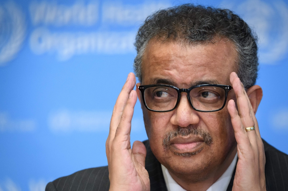 In this file photo taken on March 11, 2020 shows World Health Organization (WHO) Director-General Tedros Adhanom Ghebreyesus attending a press briefing on COVID-19 at the WHO headquarters in Geneva. The World Health Organization chief said late November 1
