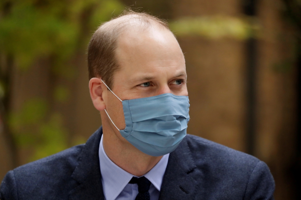 File photo: Britain's Prince William wears a protective mask as he visits St. Bartholomew's Hospital in London, Britain October 20, 2020. Matt Dunham/Pool via Reuters 
