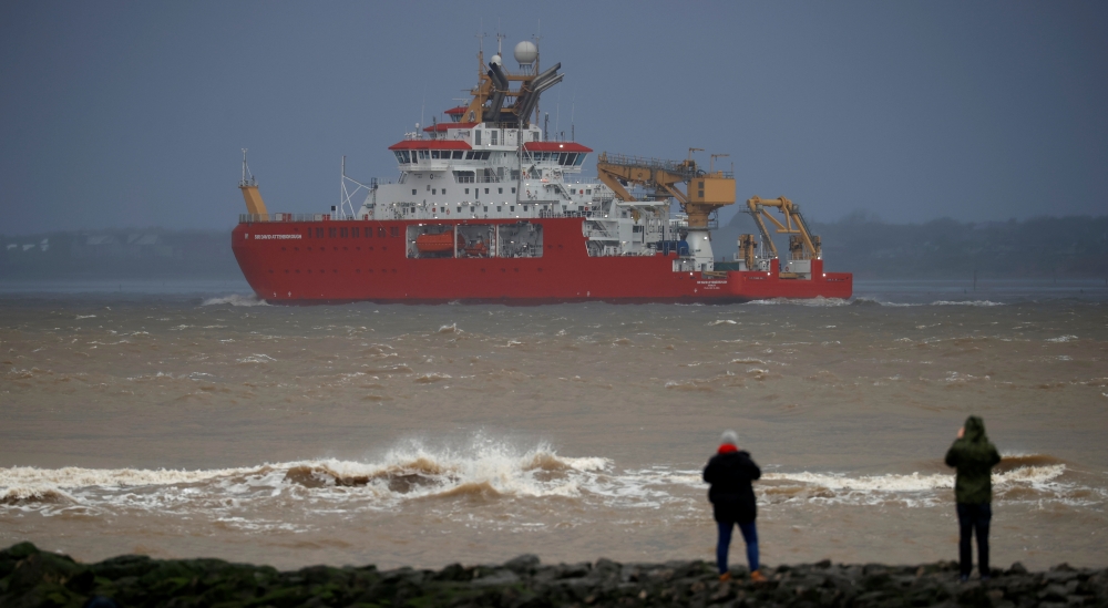 People watch as the RSS Sir David Attenborough leaves Liverpool to begin sea trials in New Brighton, Britain, November 3, 2020. REUTERS/Phil Noble