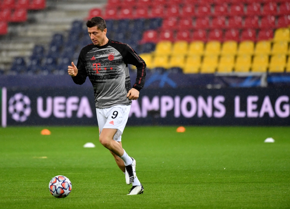 Bayern Munich's Polish forward Robert Lewandowski warms up prior to the UEFA Champions League Group A football match Salzburg v Bayern Munich in Salzburg, Austria on November 3, 2020. - Austria OUT / AFP / APA / BARBARA GINDL