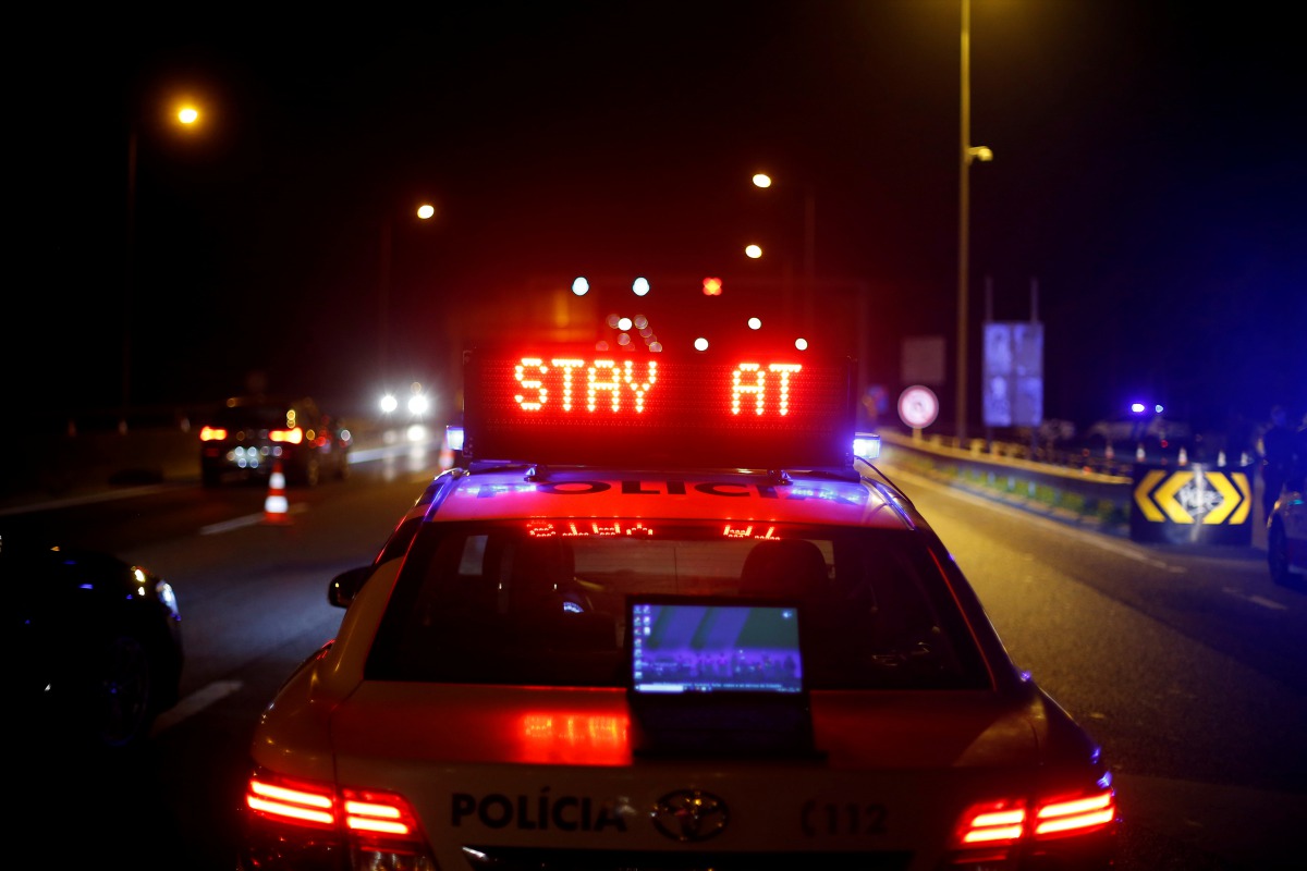 FILE PHOTO: A police car is pictured at a checkpoint to control the movement between different municipalities during the coronavirus disease (COVID-19) outbreak, in Lisbon, Portugal October 30, 2020. REUTERS/Rafael Marchante/File Photo
