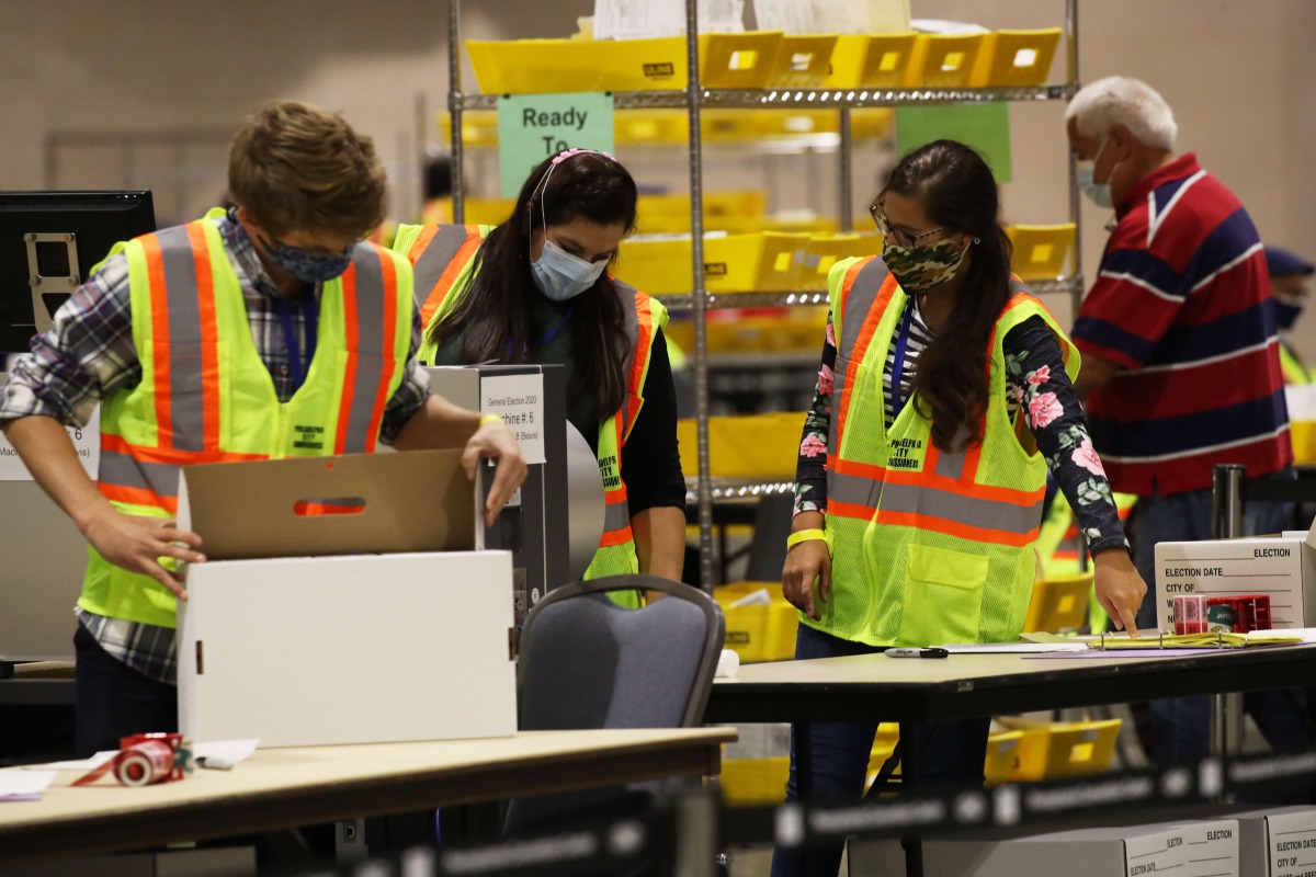 PHILADELPHIA, PENNSYLVANIA - NOVEMBER 04: Election workers count ballots on November 04, 2020 in Philadelphia, Pennsylvania. With no winner declared in the presidential election last night, all eyes are on the outcome in a few remaining swing states to de