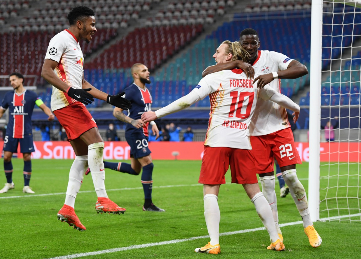Soccer Football - Champions League - Group H - RB Leipzig v Paris St Germain - Red Bull Arena, Leipzig, Germany - November 4, 2020 RB Leipzig’s Emil Forsberg celebrates scoring their second goal with teammates REUTERS/Annegret Hilse
