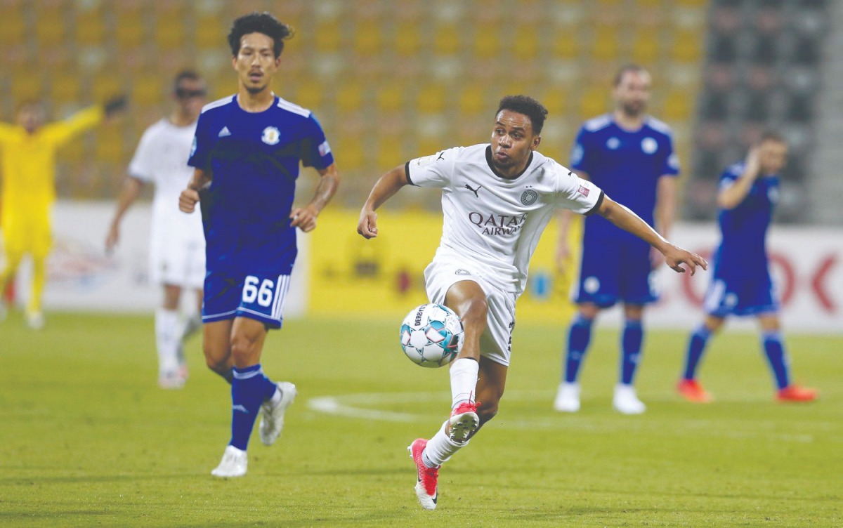 Al Sadd's Hashim Ali shoots to score against  Al Khor yesterday.
