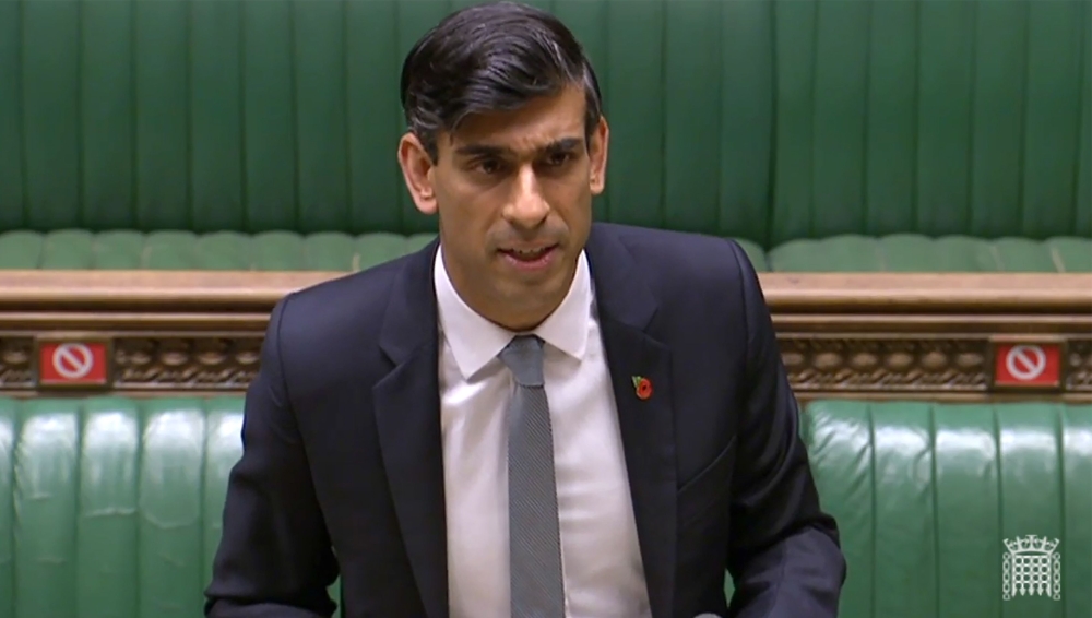 A video grab from footage broadcast by the UK Parliament's Parliamentary Recording Unit (PRU) shows Britain's Chancellor of the Exchequer Rishi Sunak as he gives an update of the economy in the House of Commons in London on November 5, 2020. AFP PHOTO / P