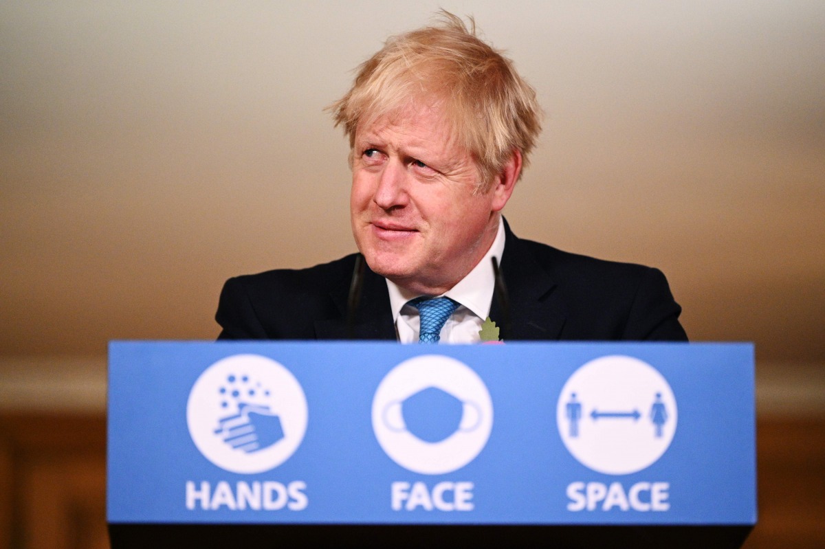 Britain's Prime Minister Boris Johnson delivers a statement on the current coronavirus statistics and testing and lockdown measures during a virtual press conference inside 10 Downing Street in central London on November 5, 2020, as new lockdown restricti