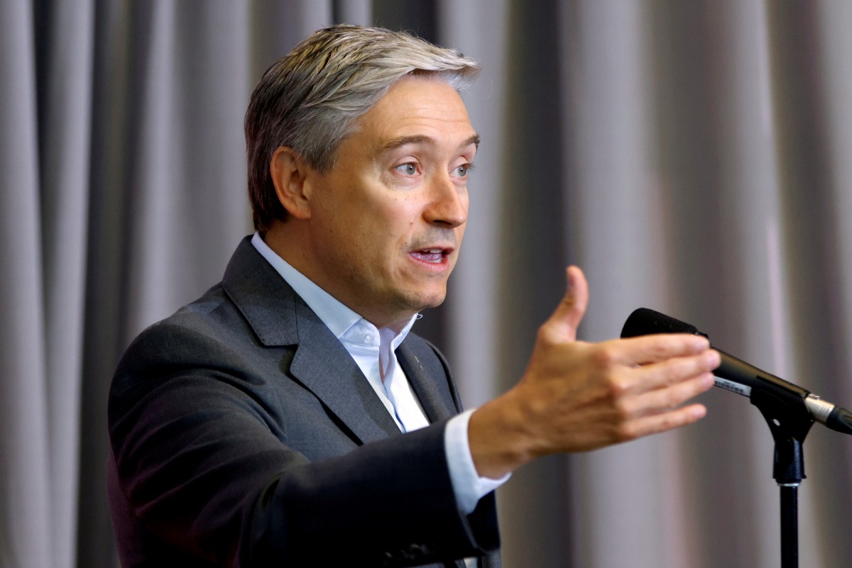 FILE PHOTO: Canada's Minister of Foreign Affairs Francois-Philippe Champagne speaks to media at a cabinet retreat in Ottawa, Ontario, Canada September 14, 2020. REUTERS/Blair Gable/File Photo
