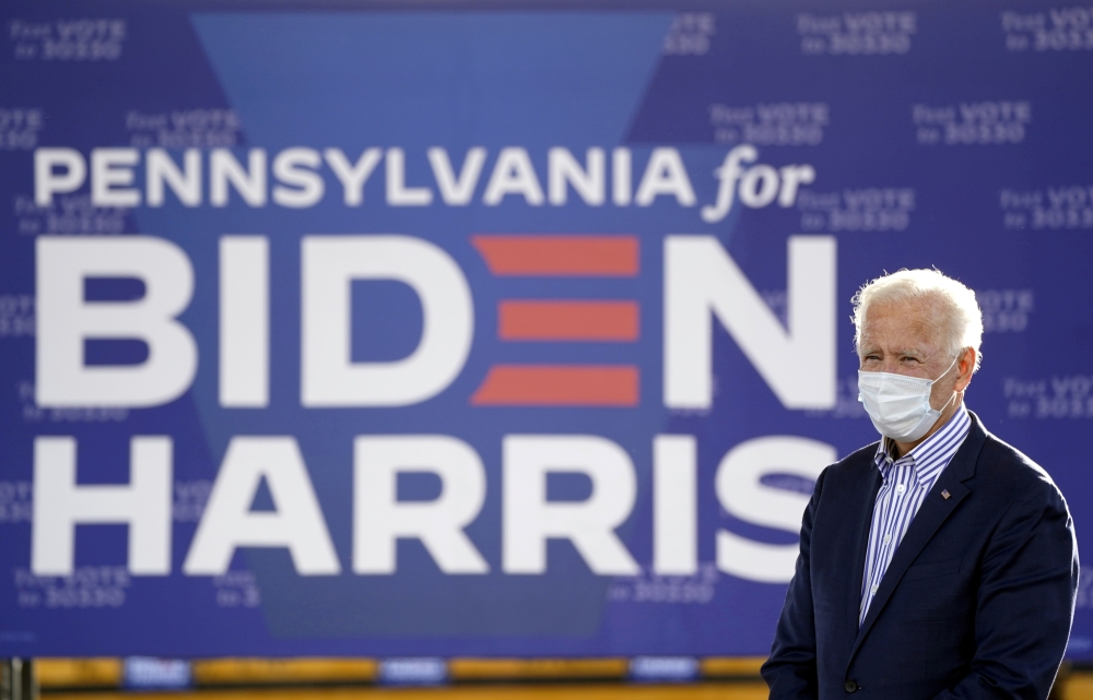 Joe Biden attends a drive-in campaign event at Dallas High School in Dallas, Pennsylvania, U.S., October 24, 2020. REUTERS/Kevin Lamarque/File Photo