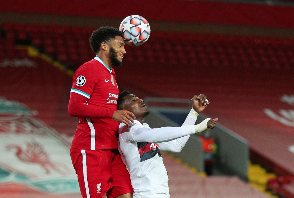 Liverpool's Joe Gomez in action with FC Midtjylland's Sory Kaba Pool via REUTERS/Peter Byrne/File Photo

