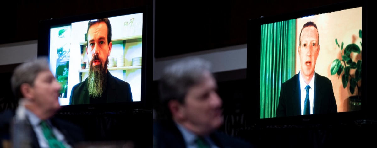 Jack Dorsey, Chief Executive Officer of Twitter (LEFT) Mark Zuckerberg, Chief Executive Officer of Facebook (RIGHT) testifies remotely as Sen. John Kennedy, R-La., looks on during the Senate Judiciary Committee hearing on 