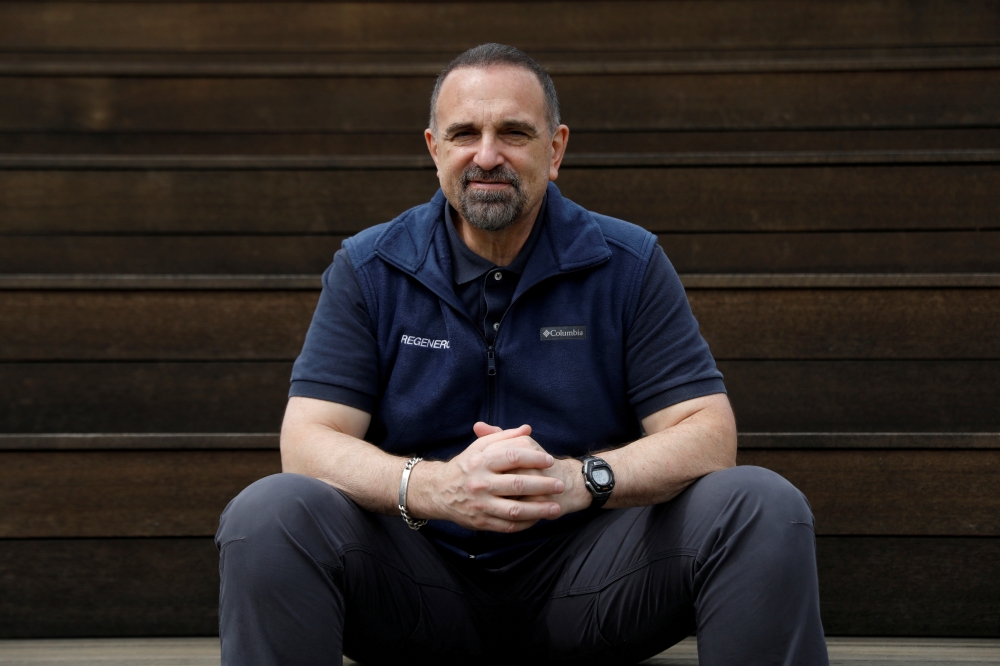FILE PHOTO: George Yancopoulos, Regeneron Pharmaceuticals Co-Founder, President and Chief Scientific Officer, poses for a photograph on the company's Westchester campus in Tarrytown, New York, U.S. September 17, 2020. Picture taken September 17, 2020. REU