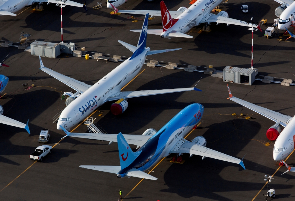 FILE PHOTO: Boeing 737 Max aircraft are parked in a parking lot at Boeing Field in this aerial photo over Seattle, Washington, U.S. June 11, 2020. REUTERS/Lindsey Wasson