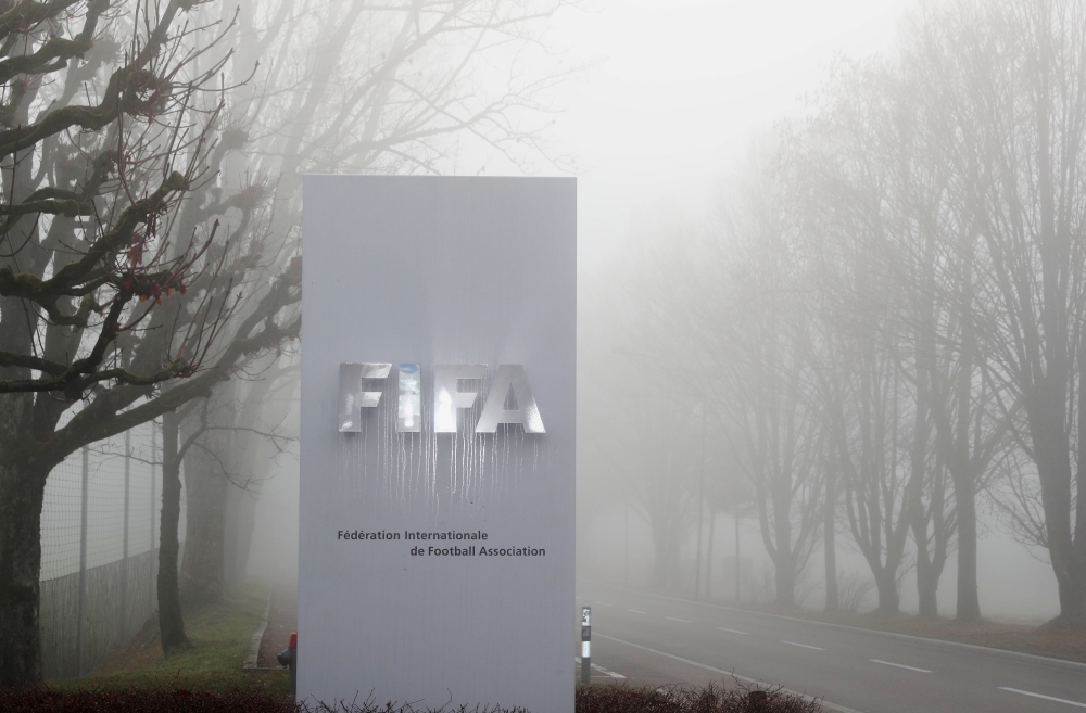 FIFA's logo is seen in front of its headquarters during a foggy autumn day in Zurich, Switzerland November 18, 2020. REUTERS/Arnd Wiegmann