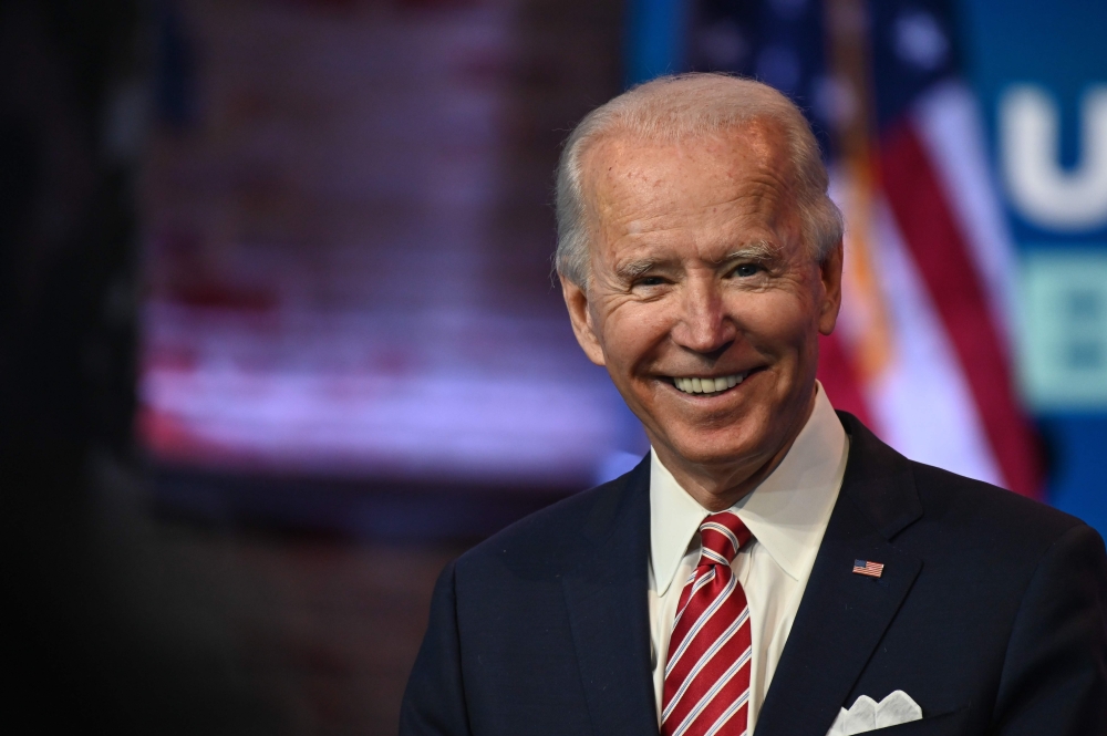 In this file photo taken on November 16, 2020, US President-elect Joe Biden answers questions from the press in Wilmington, Delaware. Biden turned 78 on November 20, 2020, exactly two months before he is to succeed Donald Trump in the White House. The for