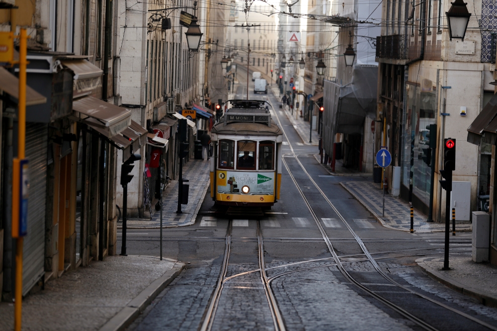 A tram is pictured on the empty street during the coronavirus disease (COVID-19) outbreak, in downtown Lisbon, Portugal October 31, 2020. REUTERS/Rafael Marchante/File Photo