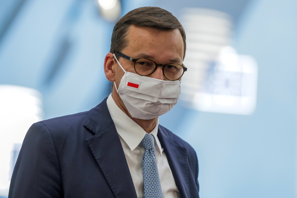 FILE PHOTO: Poland's Prime Minister Mateusz Morawiecki arrives for the fourth day of the European Council meeting in Brussels, Belgium, July 20, 2020. Stephanie Lecocq/Pool via REUTERS