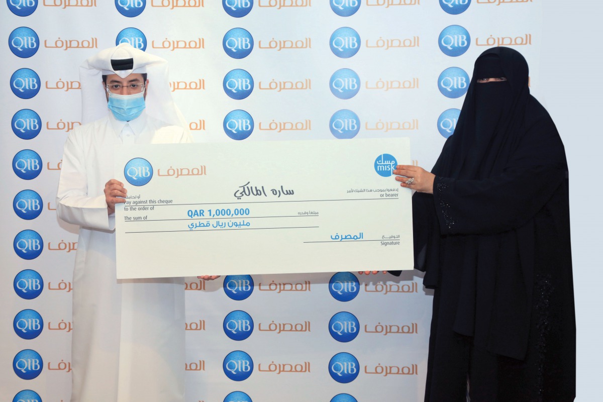 Sara Al Malki receiving the QR1m grand prize in Doha recently.  