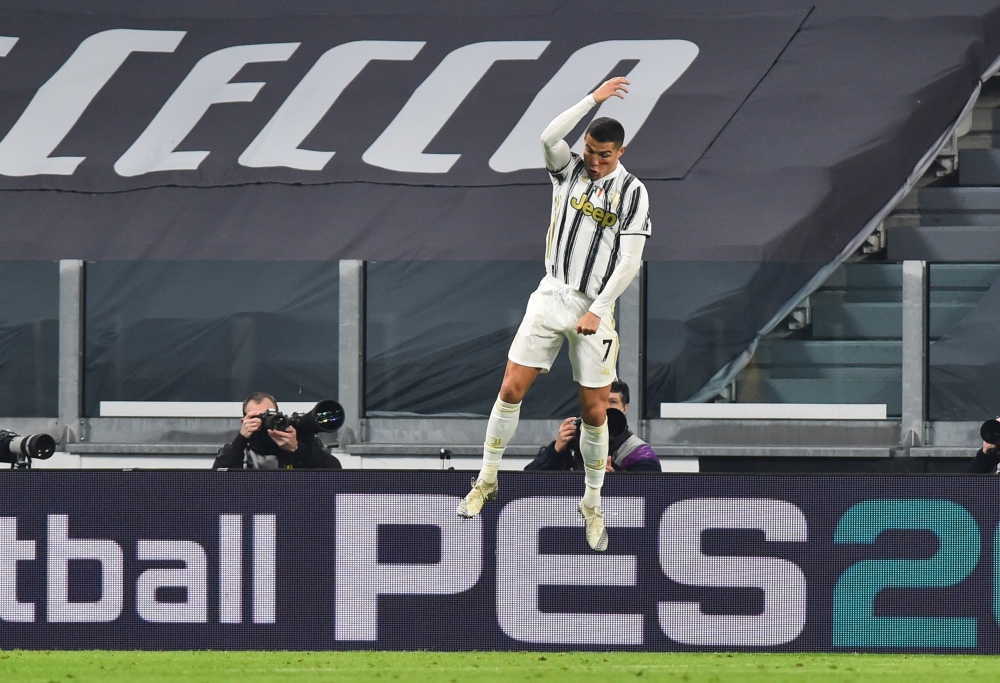 Soccer Football - Serie A - Juventus v Cagliari - Allianz Stadium, Turin, Italy - November 21, 2020 Juventus' Cristiano Ronaldo celebrates scoring their second goal REUTERS/Massimo Pinca