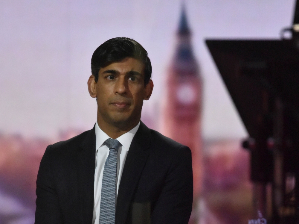 Britain's Chancellor of the Exchequer Rishi Sunak looks on during BBC TV's The Andrew Marr Show in London, Britain November 22, 2020. Picture taken through glass. Jeff Overs/BBC/Handout via REUTERS 