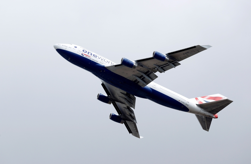 File photo: A British Airways Boeing 747 G-CIVD leaves London Heathrow airport on its final flight, the first of 31 jumbo jets to be retired early by the airline due to the coronavirus disease (COVID-19) pandemic, in London, Britain August 18, 2020. Reute