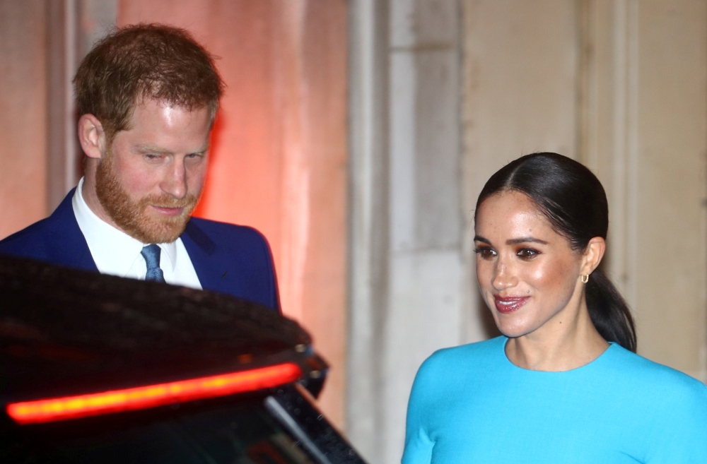 File photo: Britain's Prince Harry and his wife Meghan, Duchess of Sussex, leave after attending the Endeavour Fund Awards in London, Britain March 5, 2020. REUTERS/Hannah McKay/File Photo/File Photo