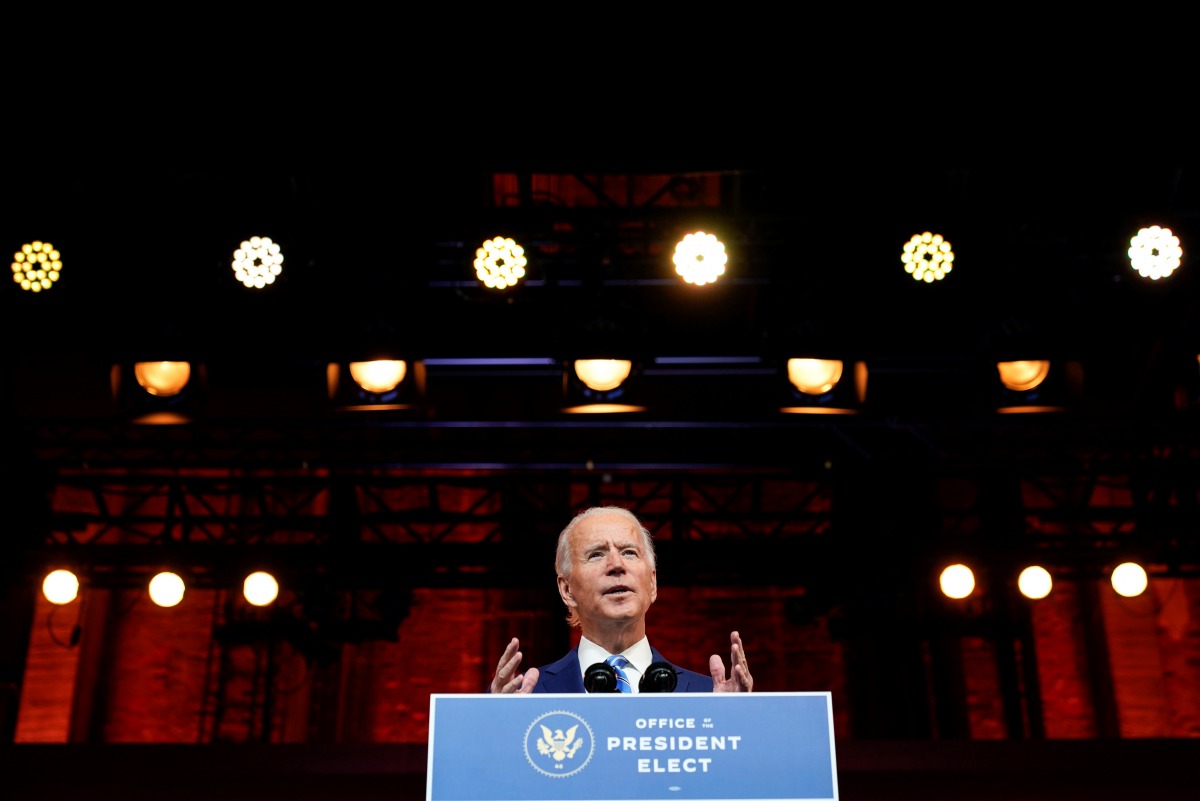 U.S. President-elect Joe Biden delivers a pre-Thanksgiving address at his transition headquarters in Wilmington, Delaware, U.S., November 25, 2020. REUTERS/Joshua Roberts
