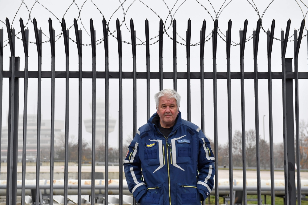 Albrecht Broemme, head coordinator of the six coronavirus vaccination centres that will be set up in Berlin, poses before an AFP interview at the former Tegel airport in Berlin on November 25, 2020. By mid-December 2020, the terminal C of the former West 