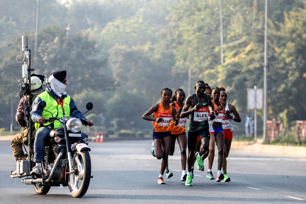 Elite runners take part in the Airtel Delhi Half Marathon in New Delhi, India, November 29, 2020. REUTERS/Anushree Fadnavis