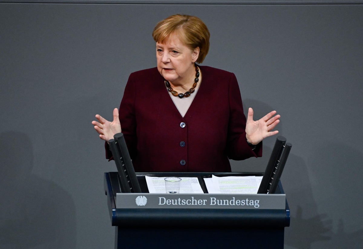 German Chancellor Angela Merkel delivers a speech during a session at the Bundestag (lower house of parliament) on November 26, 2020 in Berlin on measures to curb the spread of the novel coronavirus (COVID-19). / AFP / Tobias SCHWARZ

