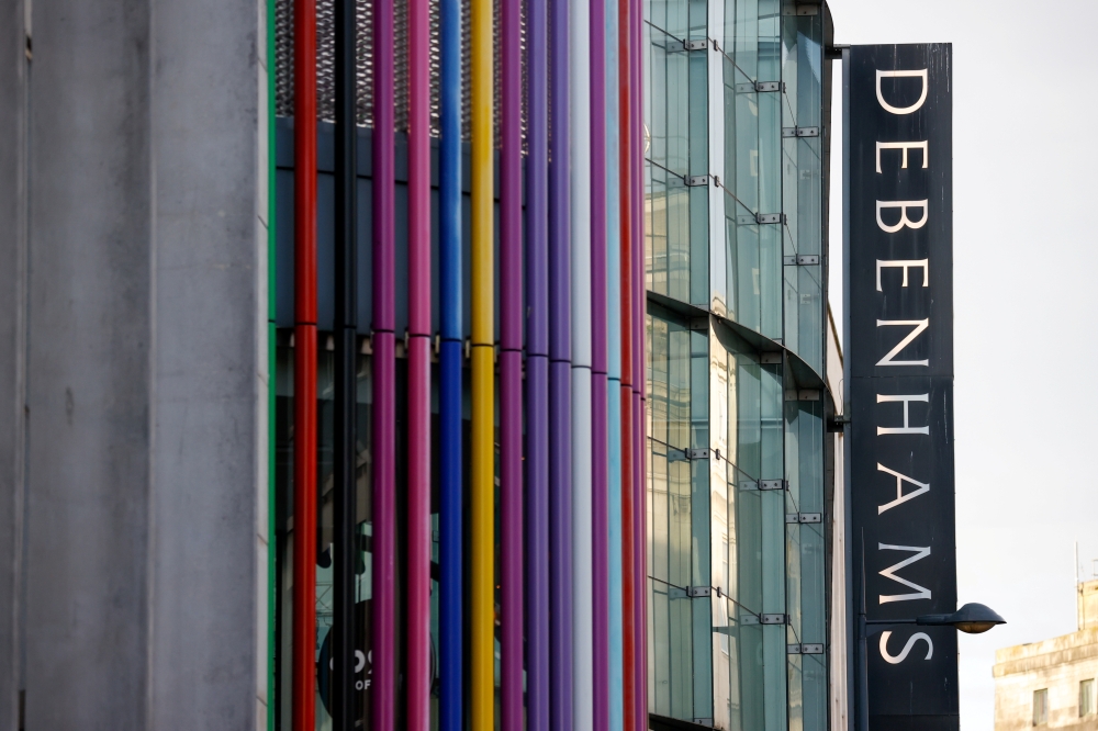 Debenhams' logo is pictured amid the outbreak of the coronavirus disease (COVID-19), in Liverpool, Britain December 1, 2020. REUTERS/Phil Noble