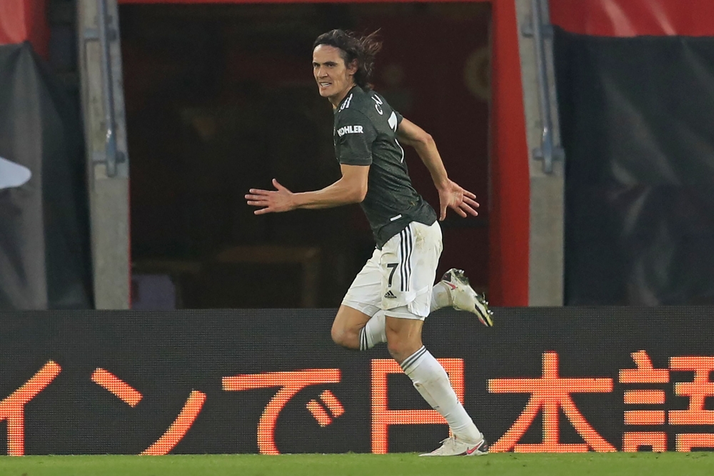 Manchester United's Uruguayan striker Edinson Cavani celebrates after scoring their third goal during the English Premier League football match between Southampton and Manchester United at St Mary's Stadium in Southampton, southern England on November 29,