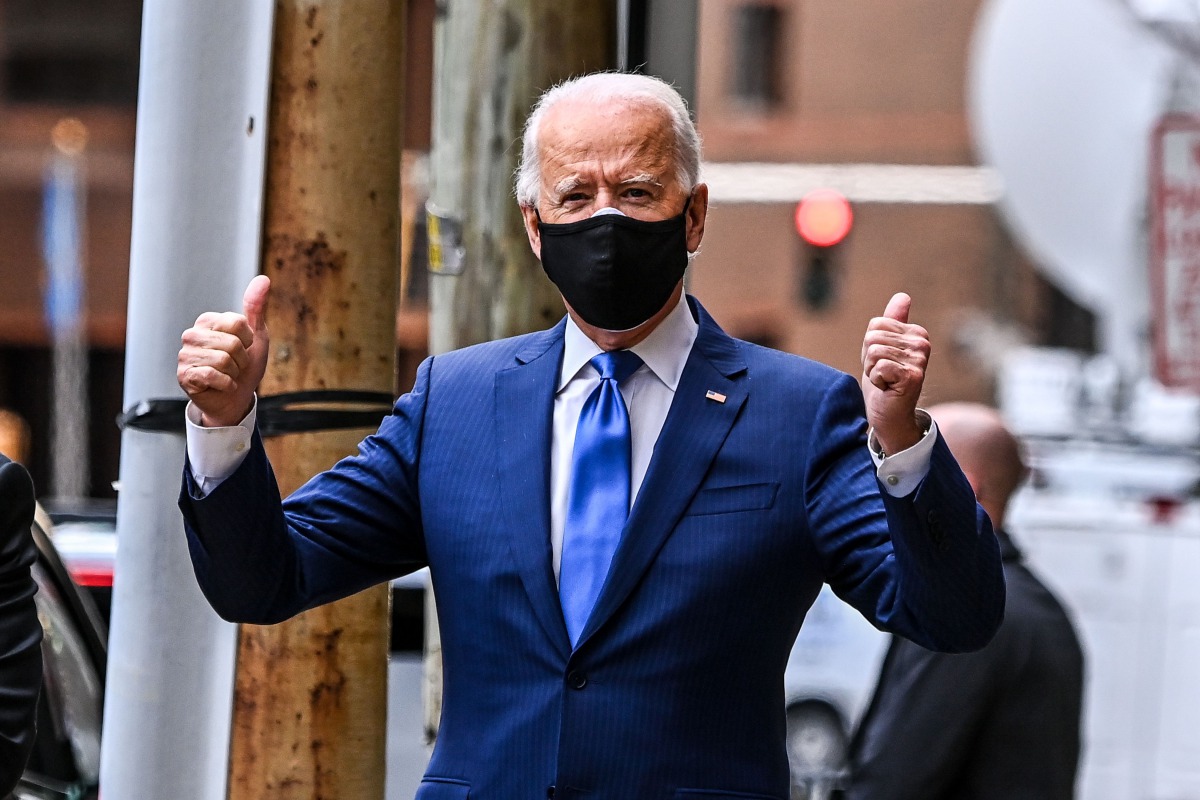 US President-elect Joe Biden departs after the event at The Queen Theater in Wilmington, Delaware, on December 1, 2020. President-elect Joe Biden announced his economic team at The Queen Theatre in Wilmington, Delaware, on December 1, 2020. / AFP / CHANDA