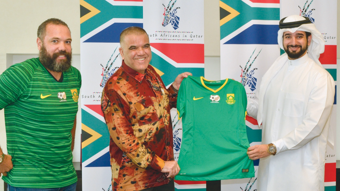 FROM LEFT: Community representative Bradely Habana, South Africa Ambassador to Qatar, H E Faizel Moosa, and QFA General Secretary, Mansoor Al Ansari pose for a group photo.