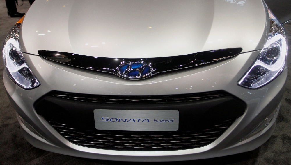 The Hyundai Sonata hybrid is displayed during the first media preview day at the 2011 Chicago Auto Show in Chicago, Illinois February 9, 2011. REUTERS/Frank Polich/File Photo