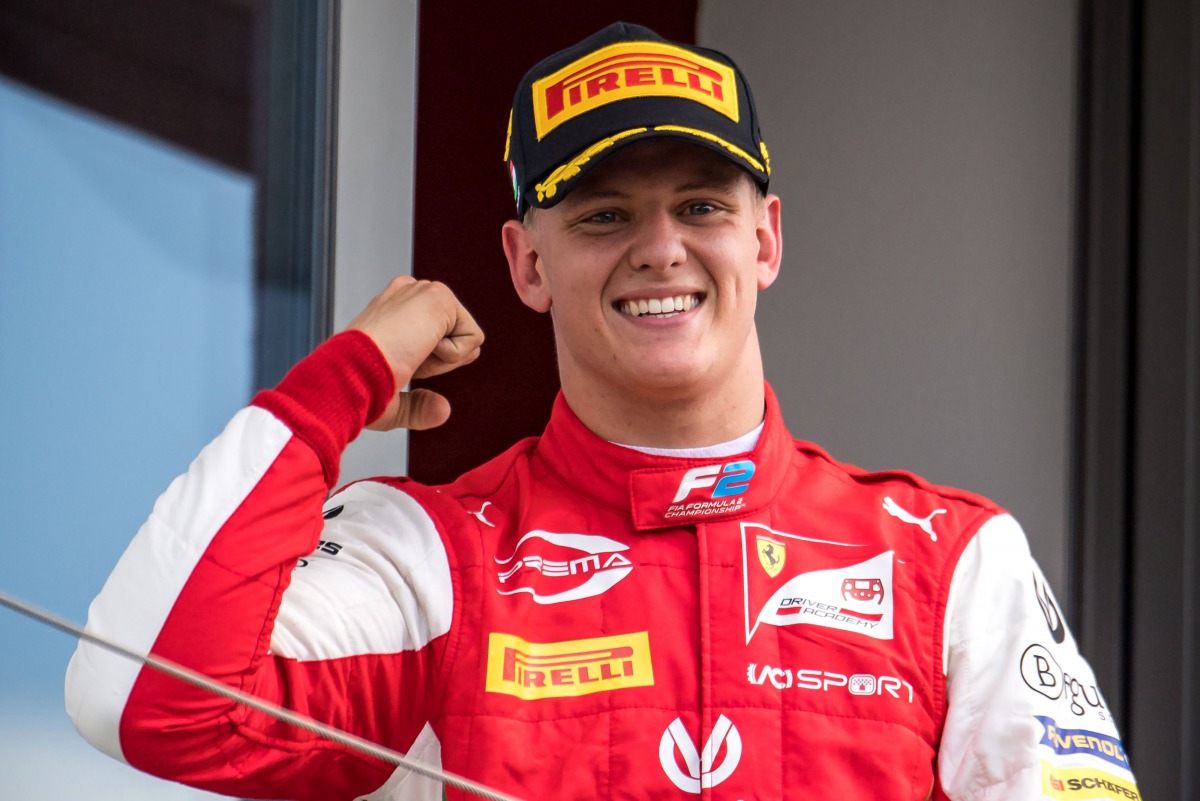 (FILES) In this file photo taken on August 4, 2019 Prema Racing's German driver Mick Schumacher celebrates after winning the Formula Two championship race of the Hungarian Grand Prix at the Hungaroring circuit in Mogyorod near Budapest./ AFP / ANDREJ ISAK