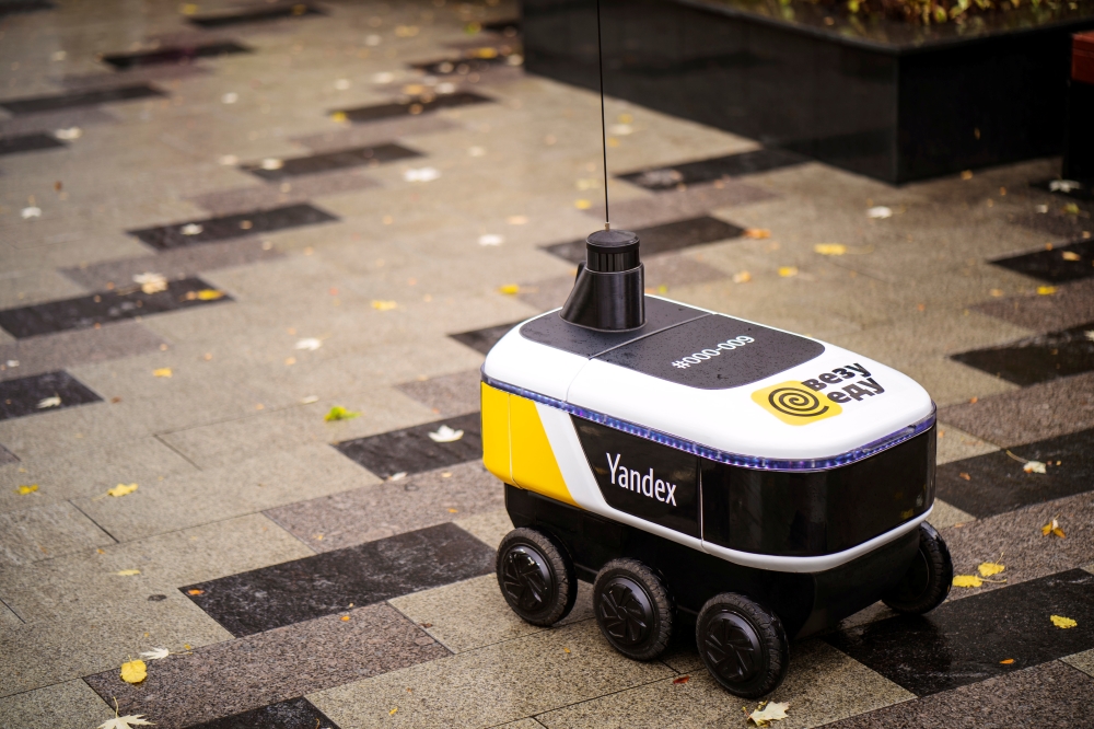 A driverless robot called Yandex.Rover, for delivering hot restaurant meals, is seen in this handout photo, in Moscow, Russia September 6, 2020. Picture taken September 6, 2020. Yandex/Handout via REUTERS