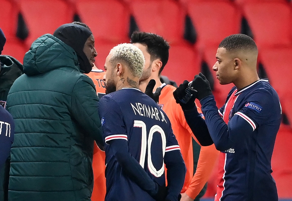 Paris Saint-Germain's decisive Champions League game with Istanbul Basaksehir was suspended on December 9 in the first half as the players walked off amid allegations of racism by one of the match officials. (AFP / FRANCK FIFE)
