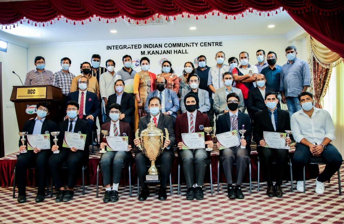 Winners and organisers of the TraQuest Quiz Competition pose for a photo during the award ceremony at the Integrated Indian Community Centre.